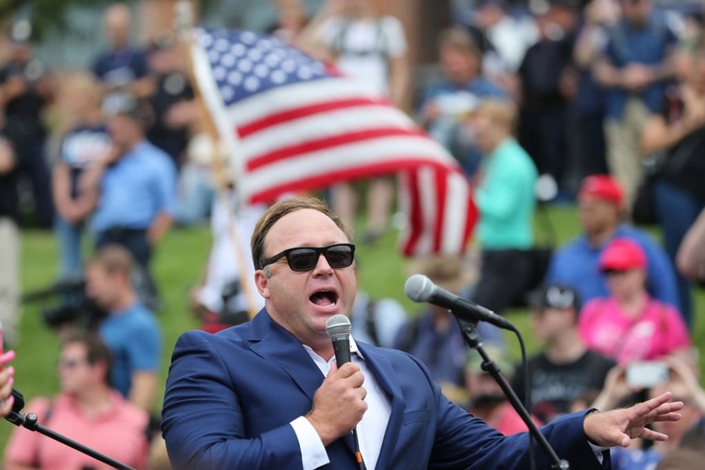 Alex Jones in 2016. Facebook says it has taken down four pages belonging to the conspiracy theorist for violating its hate speech and bullying policies. Photo: Philadelphia Inquirer
