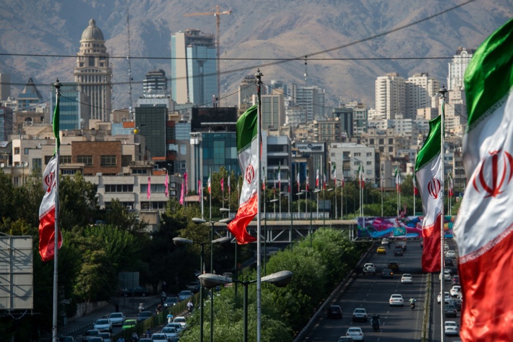 Iranian flags in Tehran on Saturday. Iran watchers say Washington’s demands are tantamount to seeking a new government in Tehran. Photo: Bloomberg