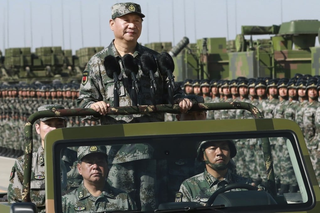 Xi Jinping inspects troops during last year’s parade marking the 90th anniversary of the PLA’s founding. Last week, Xi warned that the military should be on high alert. Photo: Xinhua via AP