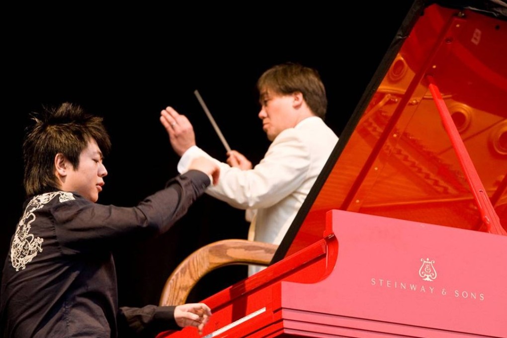 The Chinese pianist Lang Lang plays a red Steinway at a concert with the New York Philharmonic. Photo: AP