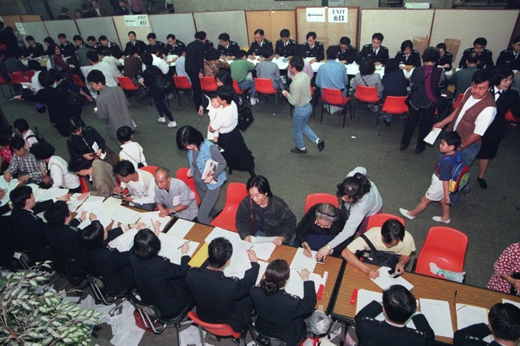 Immigration Department officers in Hong Kong process BN(O) passport applications in March 1996. Hong Kong ceased to be a British colony as of July 1, 1997. Photo: SCMP