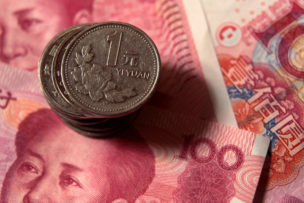 China is expected to stabilise the value of the yuan by raising the cost of foreign exchange speculation, analysts said. Photo: Reuters