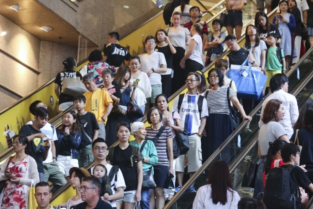 Packed escalators at the Times Square mall in Hong Kong’s Causeway Bay, during the Golden Week holiday in mainland China in October 2017. Photo: Dickson Lee