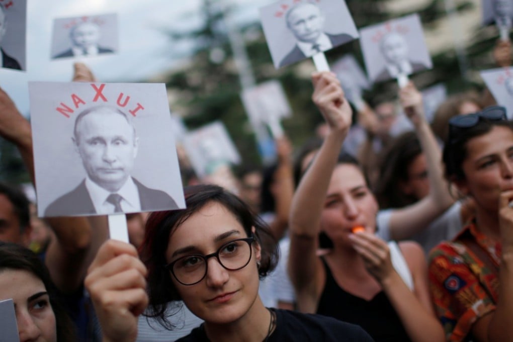 People attend a protest on the 10th anniversary of the Russia-Georgia war. Photo: Reuters