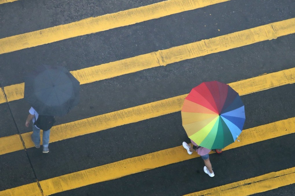 A pedestrian crossing in Tsim Sha Tsui. “Chinese only” push notifications on the Hong Kong Observatory app come across as discriminatory. Photo: Nora Tam