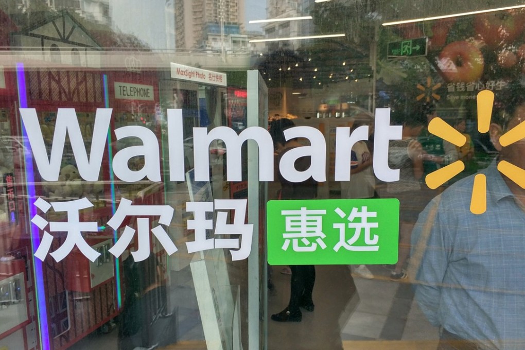 A sign of Walmart is seen at its first supermarket in China. The global retail giant said it invested about US$320 million in the latest fundraising of Logistics services company Dada-JD Daojia. Photo: Reuters