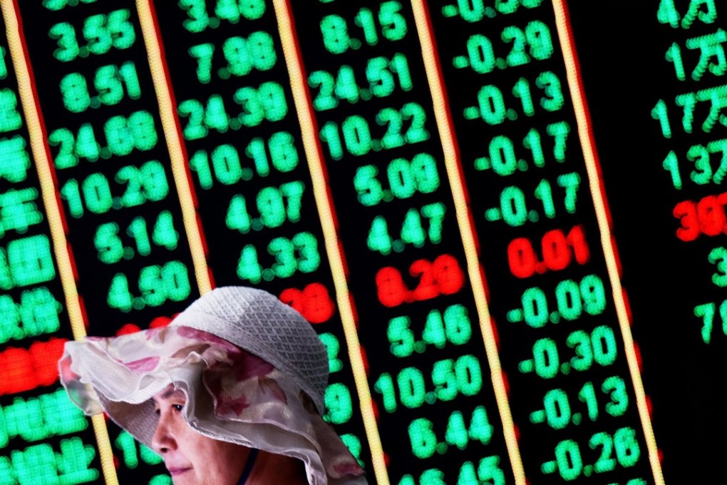 A screen showing stock market data at a brokerage in Hangzhou in Zhejiang province on June 19, 2018. Contrary to global conventions, China illustrates losses and declines in green, and uses the colour red to denote gains and advances. Photo: AFP PHOTO