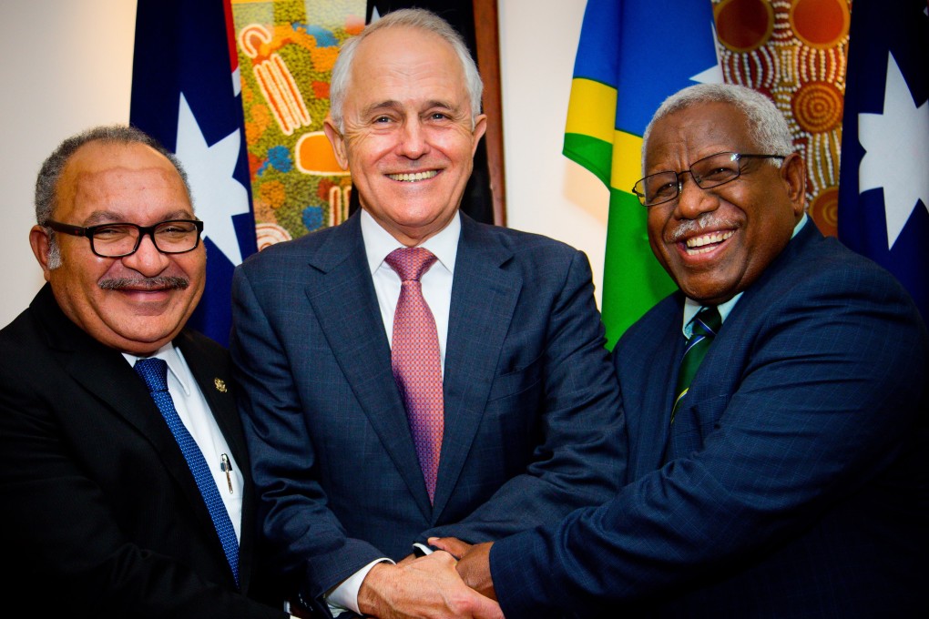 Australian Prime Minister Malcolm Turnbull pictured with Papua New Guinea Prime Minister Peter O'Neill, left, and Solomon Islands Prime Minister Rick Houenipwela in Brisbane. Photo: EPA/EFE