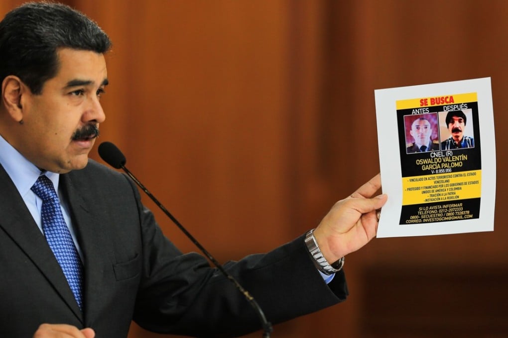 A handout picture released by the Venezuelan presidency shows President Nicolas Maduro speaking from Miraflores presidential palace in Caracas on Tuesday, about the recent drone attack that he said was an attempt on his life. Photo: Agence France-Presse