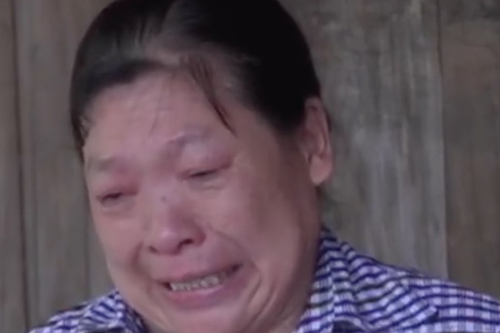 Dun Zuyi, a villager from Enshi in Hubei province, pleads in a video for her daughter, who has been missing since 2004, to return home. Photo: Qq.com