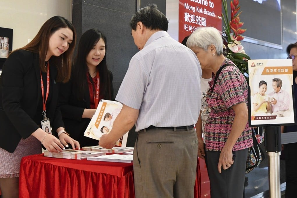 Customers collect the HKMC Annuity plan subscription intention form at HSBC’s Mong Kok branch on the first day of its launch on July 19. Photo: Handout