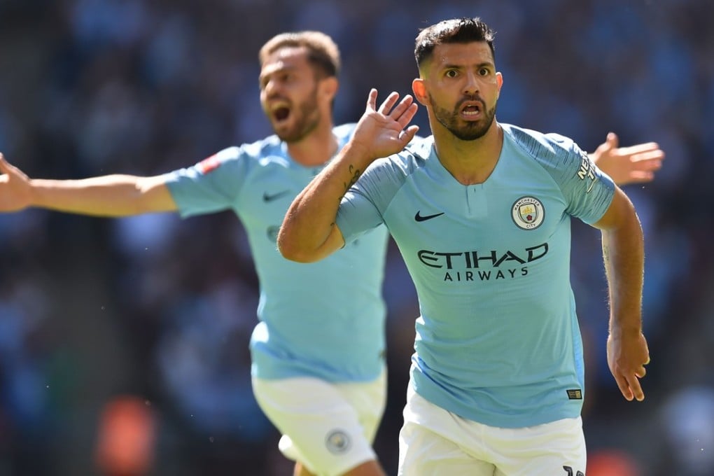 Manchester City striker Sergio Aguero celebrates after scoring the opening goal of the Community Shield against Chelsea at Wembley Stadium. Photo: AFP