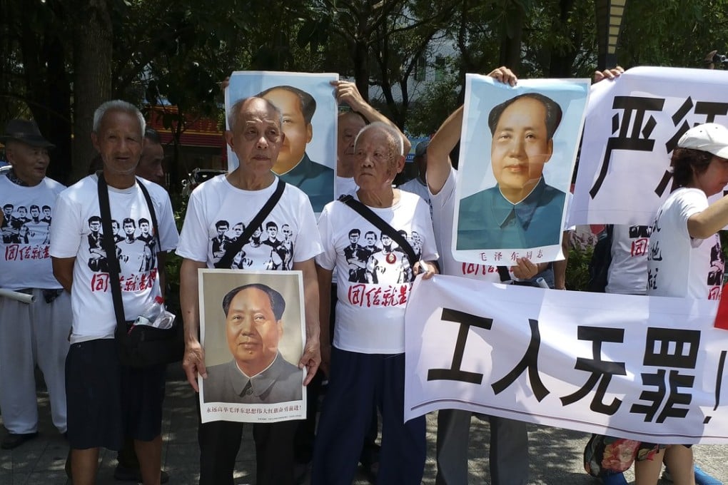Utopia demonstrators were seen holding posters of former chairman Mao Zedong, which was reminiscent of socialist rallies in the 1960s. Photo: Mimi Lau