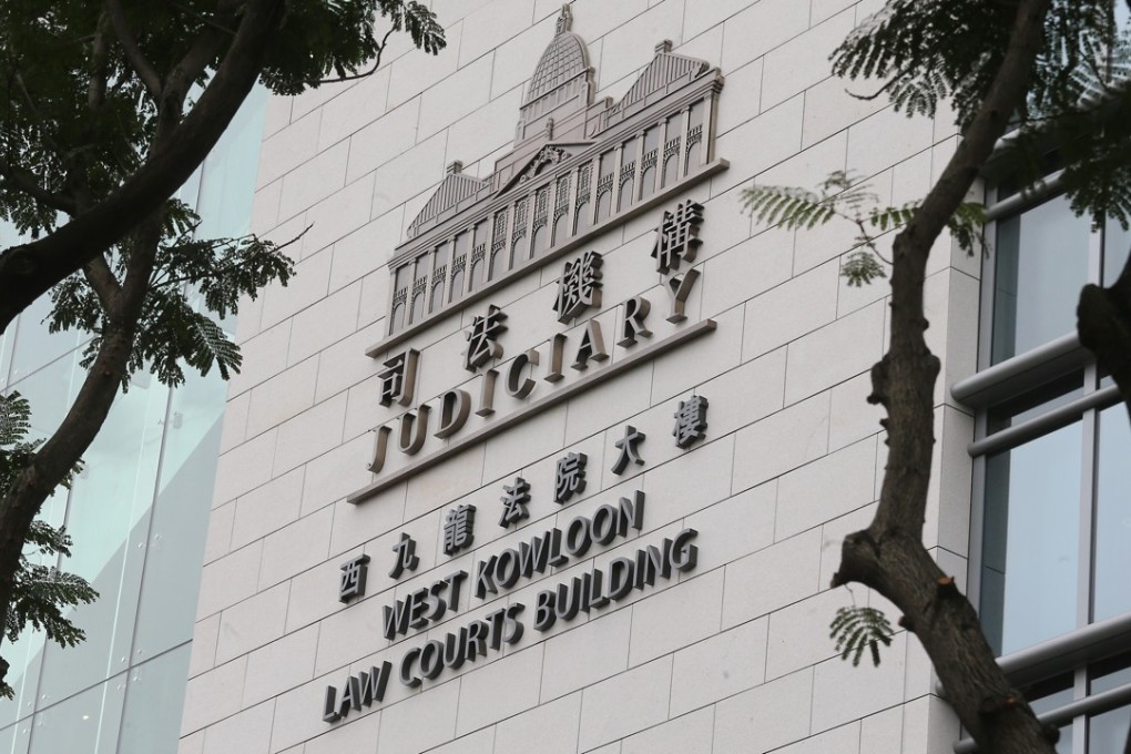 Chu Ho-lap pleaded guilty to one count of committing an act outraging indecency and 19 others of access to a computer with dishonest intent at West Kowloon Court on Monday. Photo: Dickson Lee