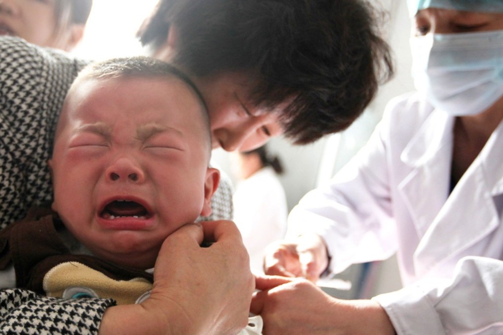A child receives a vaccination shot at a hospital in Huaibei in China's eastern Anhui province. Photo: AFP