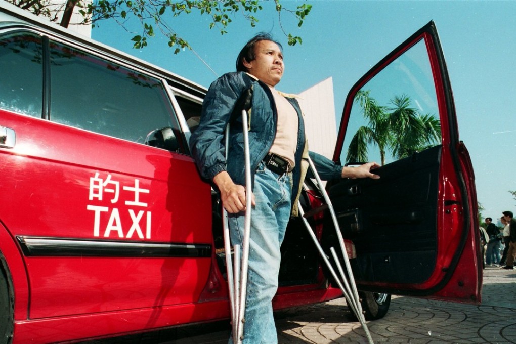 Fan To-sang, who has a walking disability, works as a Hong Kong taxi driver in May 1993. Photo: SCMP