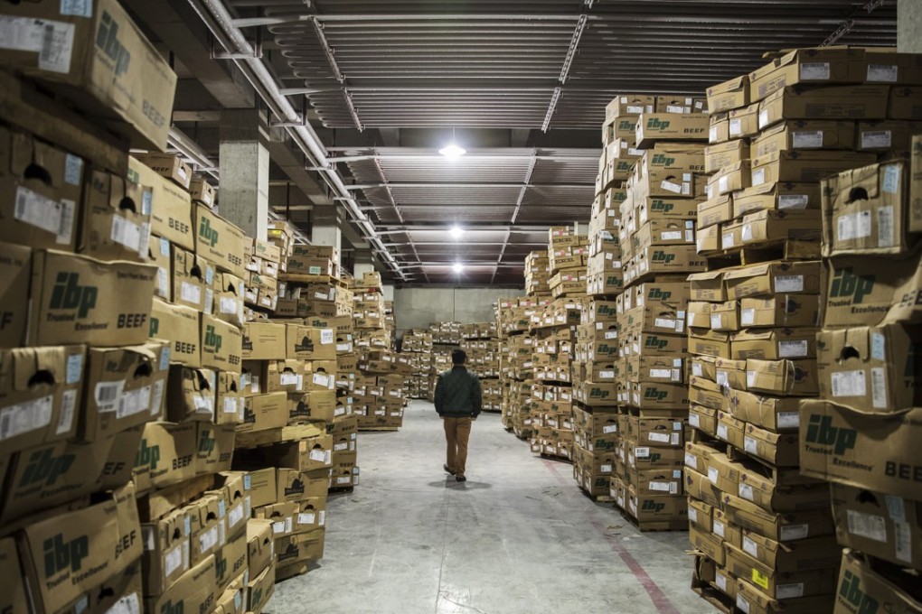 Stacks of Tyson Foods beef imported from the US sit on pallets at the Suzhou Huadong Foods cold storage facility in Suzhou, China, last month. The US-China trade war and the tariffs it brought left the warehouse housing unaffordable American steak. Photo: Bloomberg