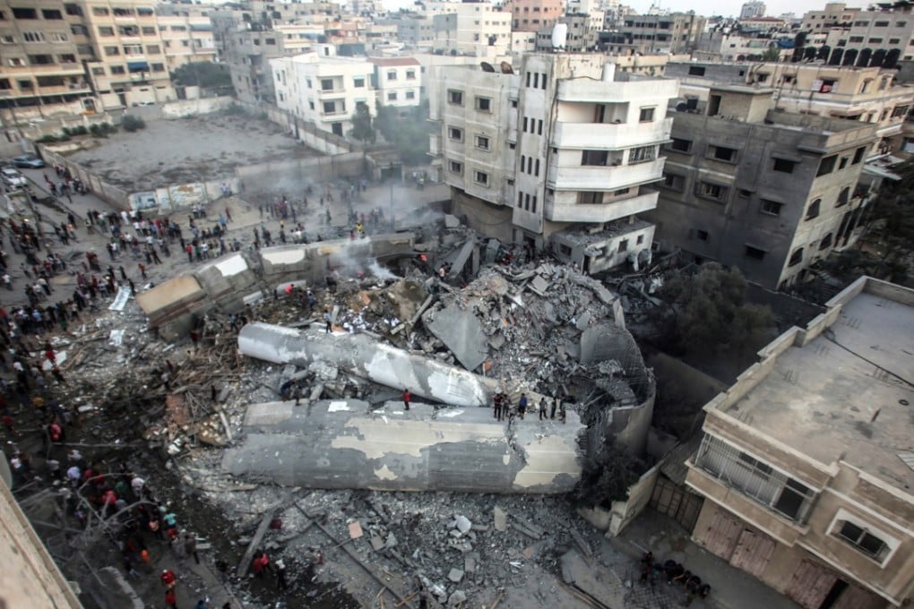 A general view of Said al-Mishal Cultural Centre building destroyed in Israeli air strike in the west of Gaza City on August 9. Photo: EPA