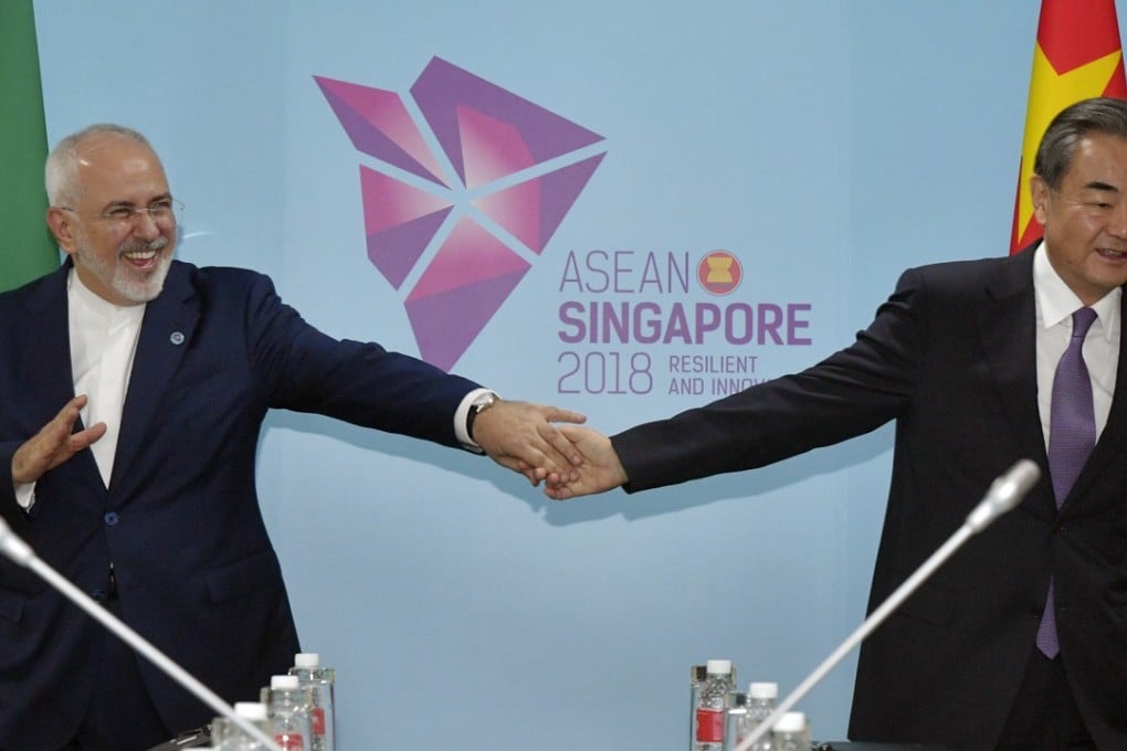 Chinese Foreign Minister Wang Yi and his Iranian counterpart Mohammad Javad Zarif part after posing for a handshake on the sidelines of the Asean meeting in Singapore last weekend. Photo: AP