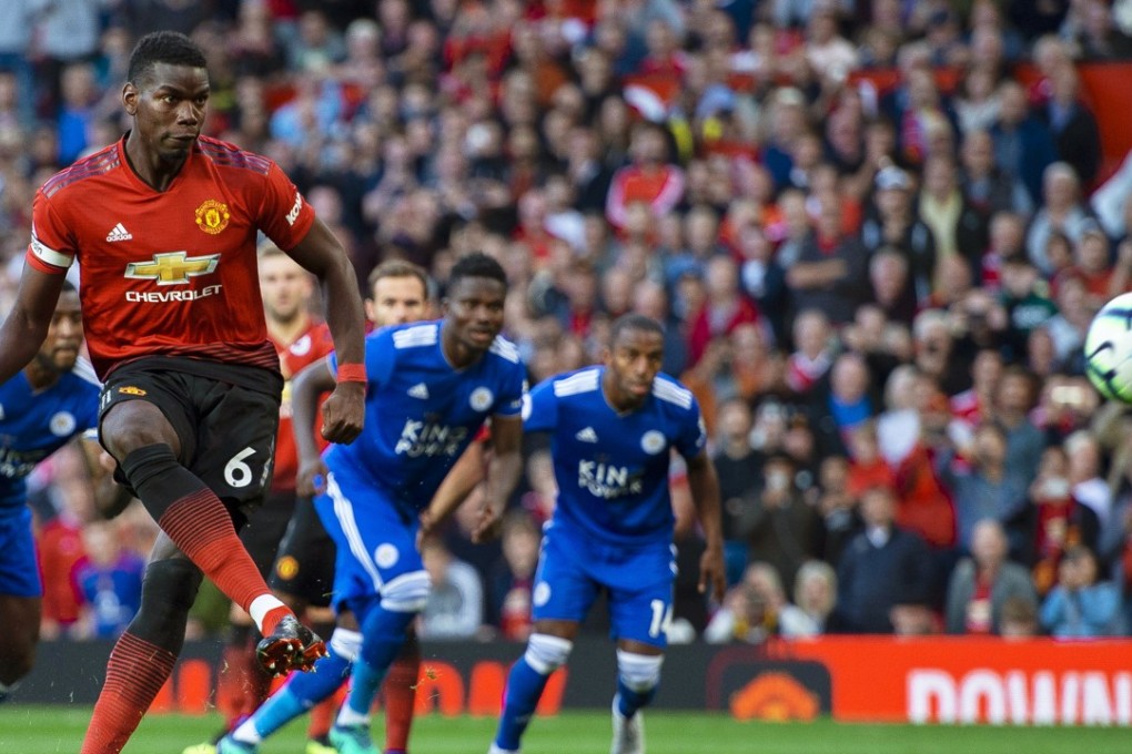 Paul Pogba scores from the penalty spot against Leicester. Photo: EPA