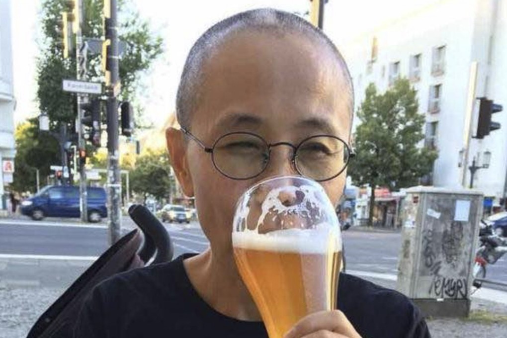 Liu Xia enjoys a beer in Berlin, her home of just over a month. Photo: courtesy of Liao Yiwu