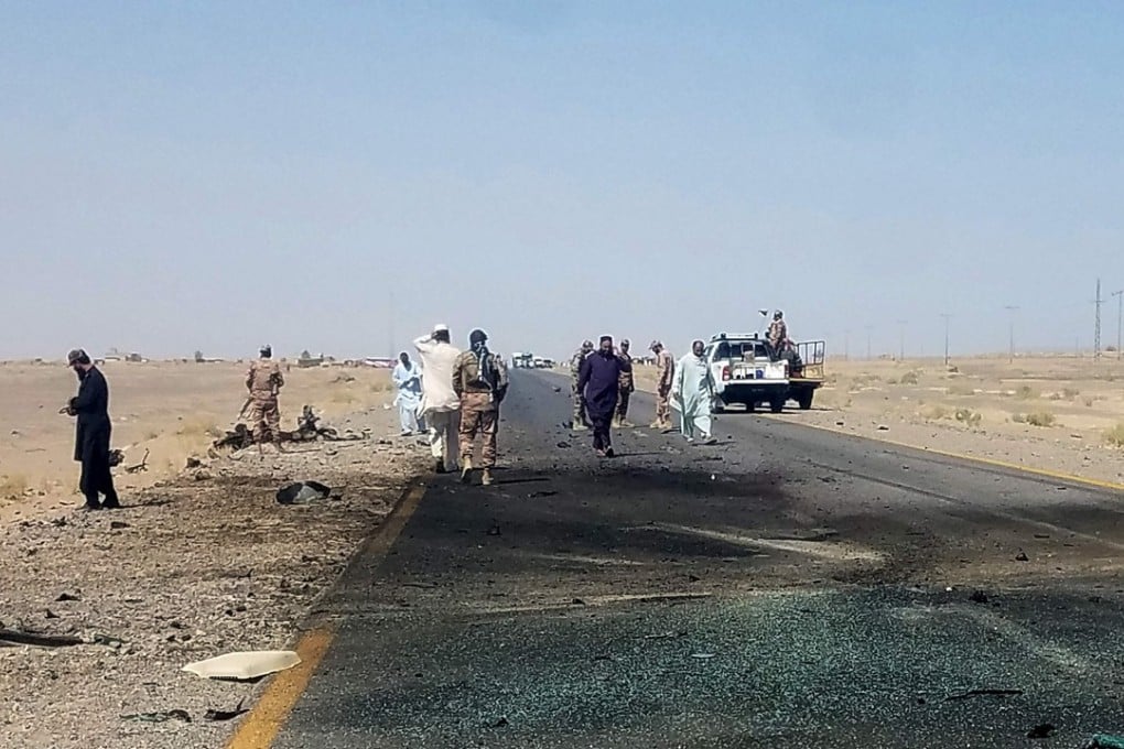 Pakistani security personnel inspect the site of a suicide attack in the Dalbandin region, around 340km from Quetta, on Saturday. Photo: AFP
