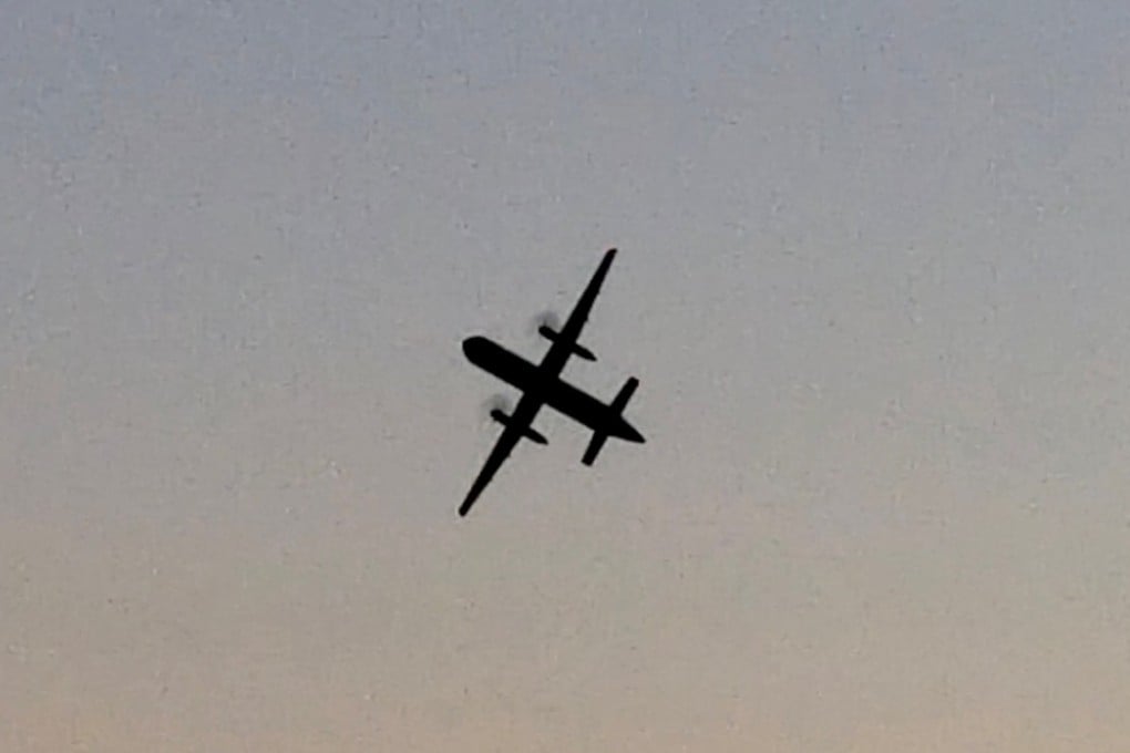 The stolen plane flying over Washington state. Photo: Reuters/John Waldron