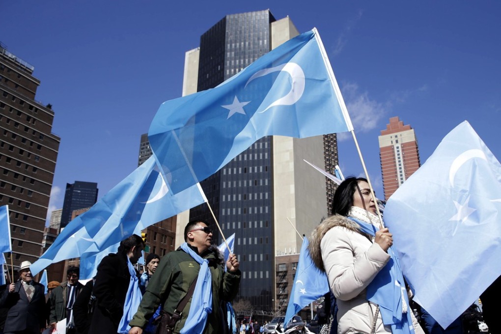 Uygurs and their supporters march near the United Nations in New York on March 15. Members of the Uygur Muslim ethnic group held demonstrations in cities around the world on that day to protest a sweeping Chinese surveillance and security campaign that has sent thousands of their people into detention and political indoctrination centers. Photo: AP