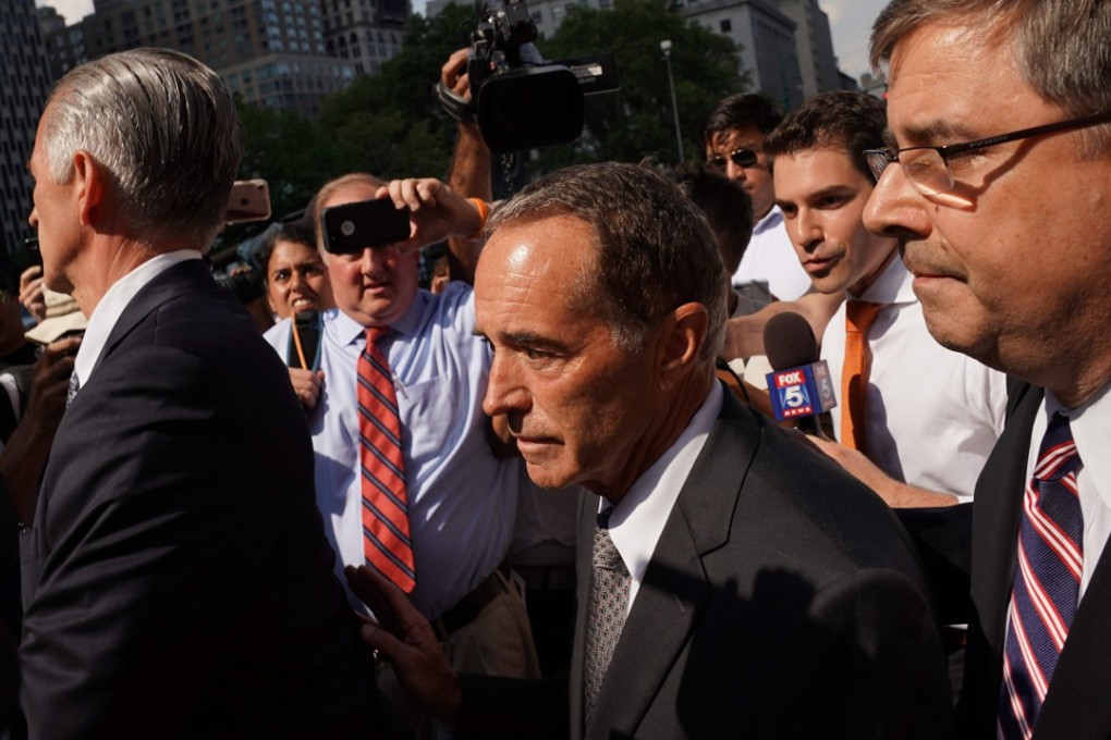 US Representative Chris Collins (centre) leaving US Federal Court in New York on August 8, 2018. Photo: AFP