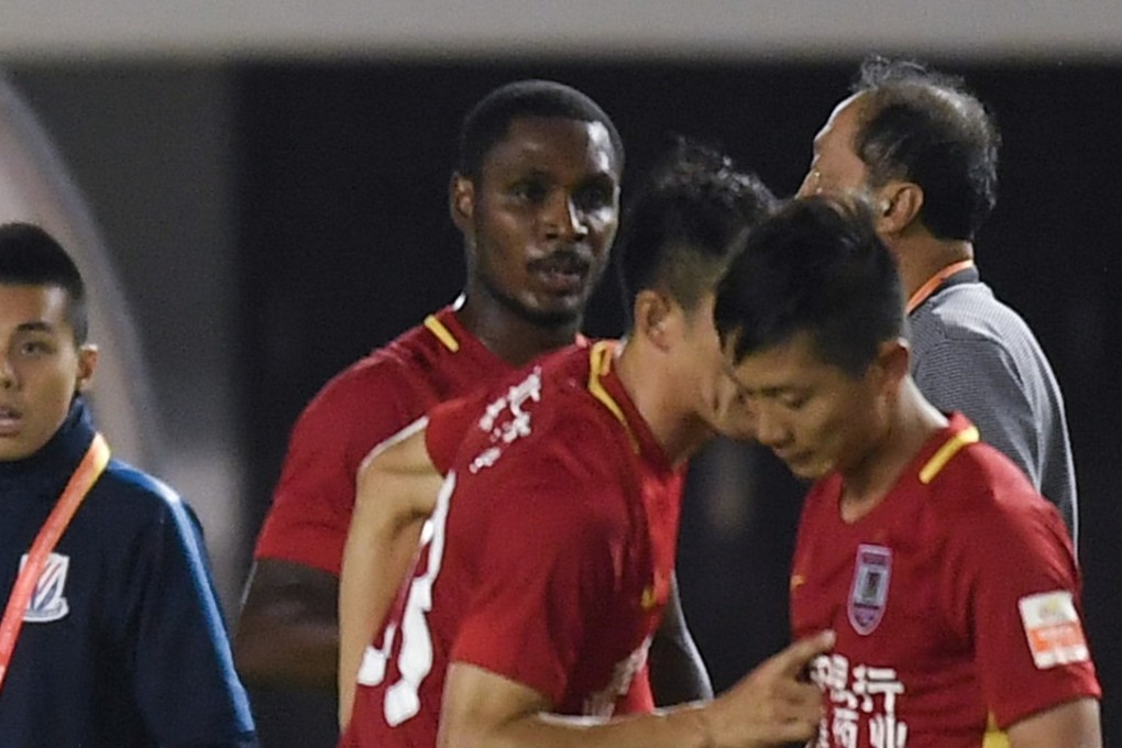Changchun Yatai’s Zhang Li (right) denies using a racial slur. Photo: Xinhua