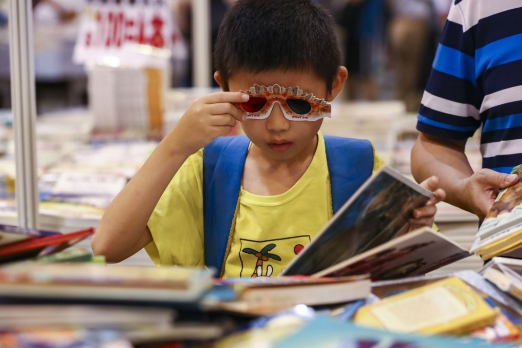 Whether it’s finding the right type of book, devising incentives to get your kids to take the bait, or other little tricks you can come up with, finding a way to get your children to read for pleasure is a vital tool in their education. Photo: Nora Tam