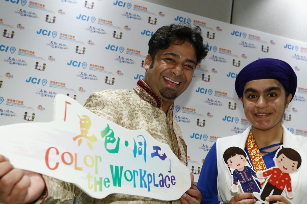 Actor and event ambassador Ricky Chan (left) with emcee Arashdeep Kaur at the release of the results of a survey on the employment of ethnic minorities, conducted by youth NGO Junior Chamber International (Harbour), in Central on July 29. Photo: Nora Tam