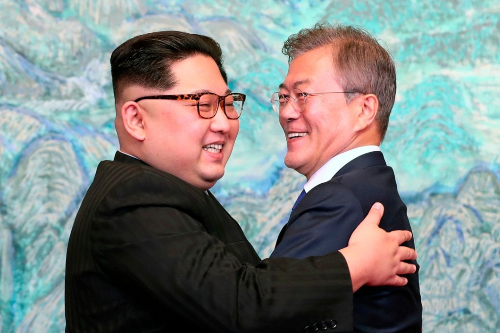 North Korean leader Kim Jong-un and South Korean President Moon Jae-in embrace each other after signing a joint statement at the border village of Panmunjom in April. File photo: AP