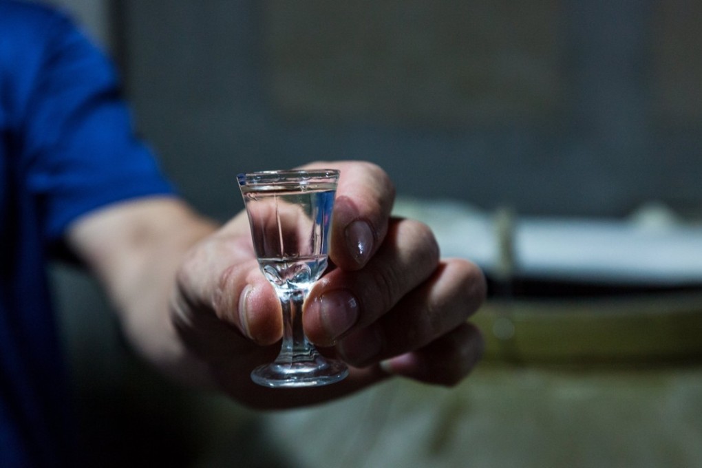Shares of Chinese makers of lower-priced baijiu liquor are outperforming those of premium brands, in the so-called consumption downgrade. Photo: EPA
