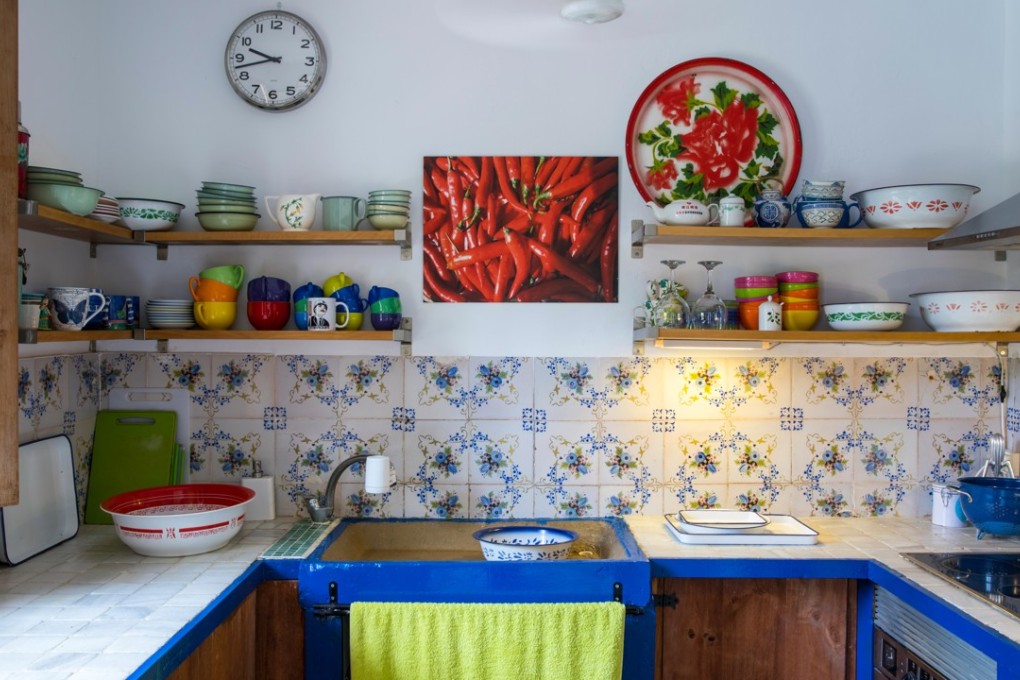 Original features, including the Mallorcan tiles, unite with bold pops of colour to infuse Cecilie Gamst Berg’s new home with character. Photography: Stuart Pearce