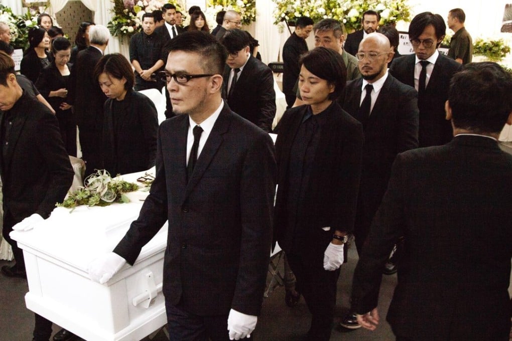 Singer Denise Ho (left) and music industry veteran Anthony Wong (front) were pallbearers at the service. Photo: Handout