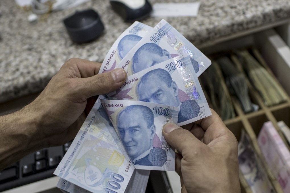 The Turkish lira stabilised against the US dollar on Tuesday after posting an all-time low on Monday. Photo: EPA
