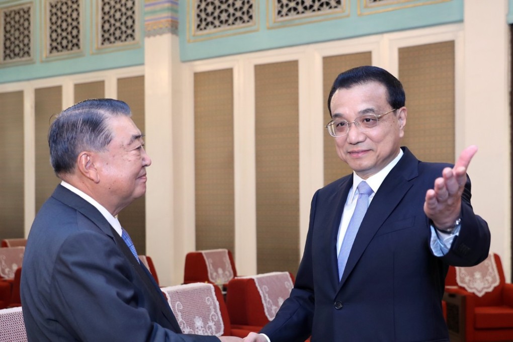 Chinese Premier Li Keqiang (right) meets Tadamori Oshima, speaker of the House of Representatives of the Japanese parliament, in Beijing last month. Photo: Xinhua