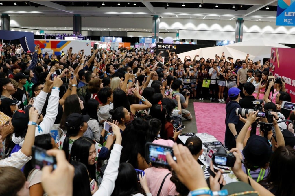 Attendees and K-pop fans gather to get a glimpse of Momoland at KCON 2018, billed as the world’s largest Korean culture convention and music festival, in Los Angeles, California. Photo: Mike Blake