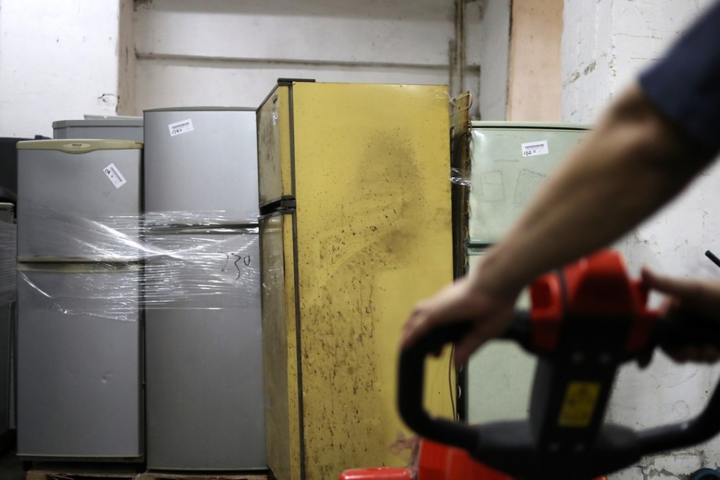 Used electronic appliances are taken away for processing. Photo: Winson Wong