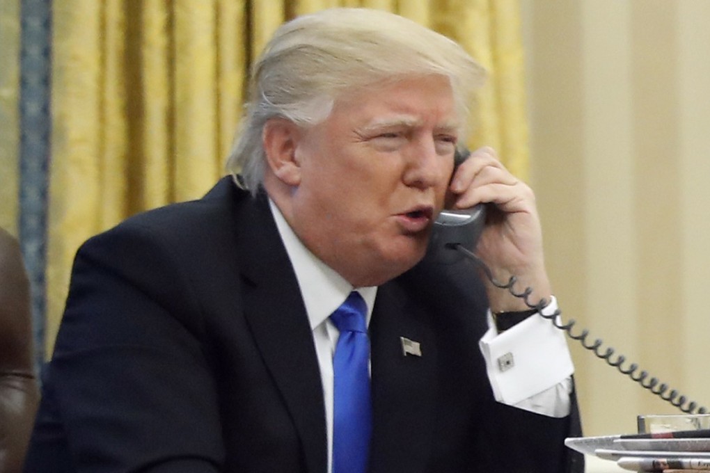 US President Donald Trump speaks on the phone with Prime Minister of Australia Malcolm Turnbull. File photo: AP