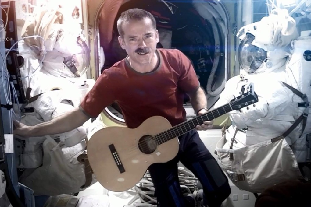 Astronaut Chris Hadfield performs a version of David Bowie’s song ‘Space Oddity’ while orbiting the Earth – something professional musicians have yet to top – on board the International Space Station in 2013. Photo: EPA/Nasa/CSA/Chris Hadfield