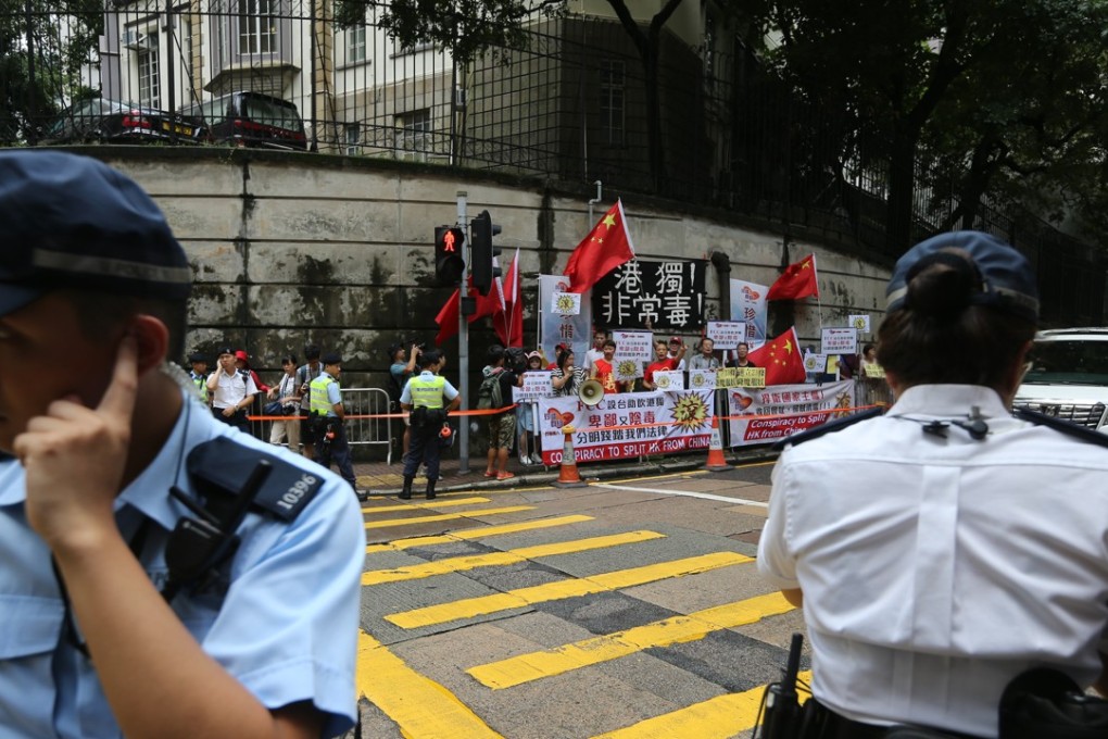 Protesters outside the Foreign Correspondents' Club in Central. Photo: Sam Tsang