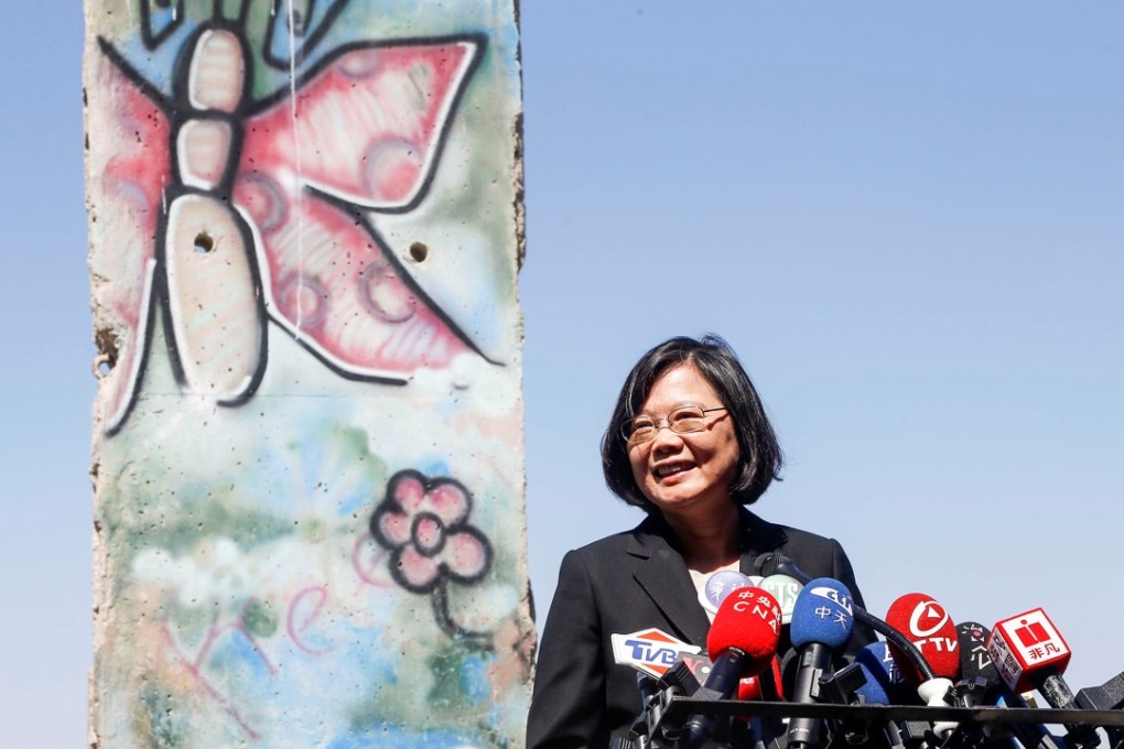 Taiwanese President Tsai Ing-wen stands in front of a section of the Berlin Wall at the Ronald Reagan Presidential Library in Simi Valley, California, on Monday. Photo: Reuters