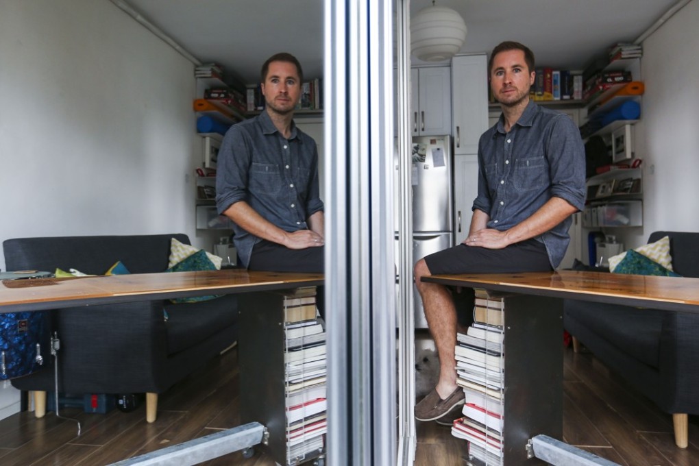 Francis Kirstein perches on a table, one of his own creations. Picture: Xiaomei Chen