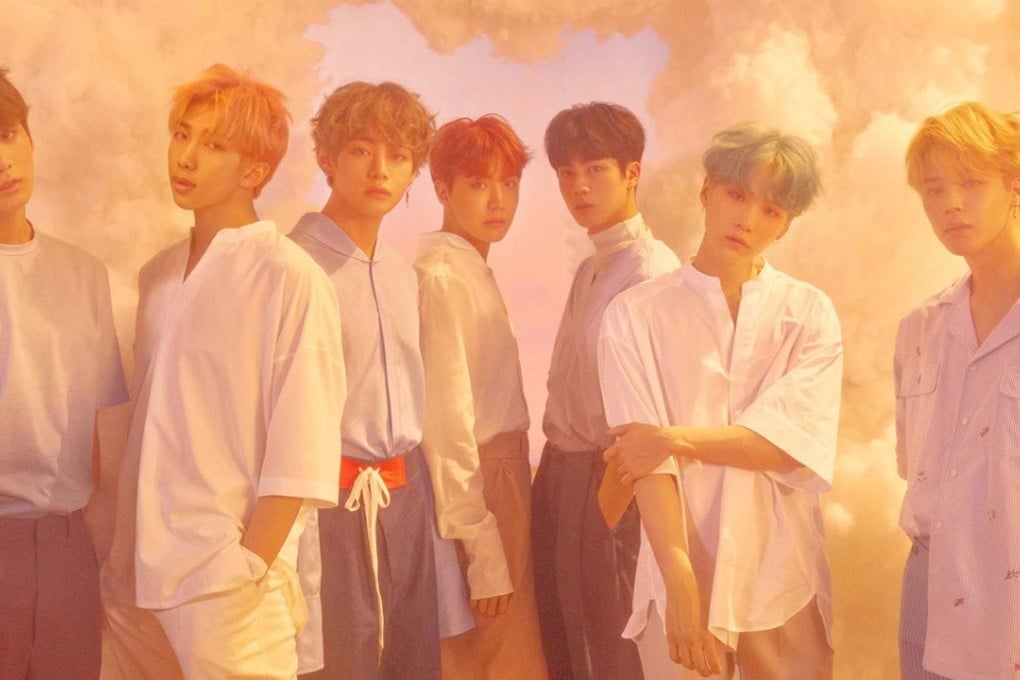 Music video director Kahn has accused K-pop superstars BTS of having plastic surgery.