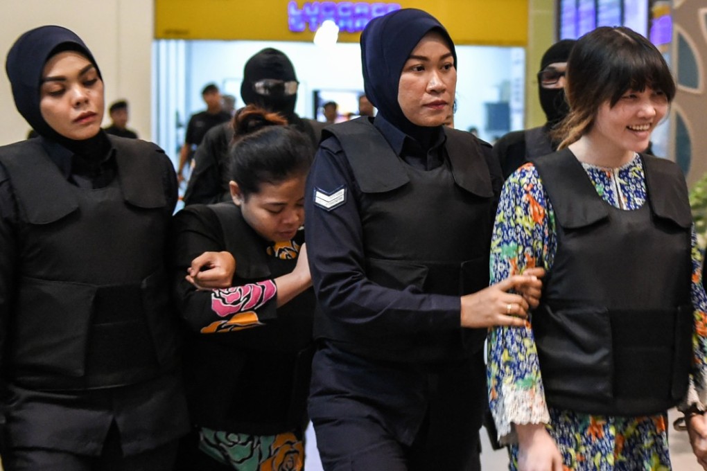 Indonesian defendant Siti Aishah and Vietnamese defendant Doan Thi Huong. Photo: AFP