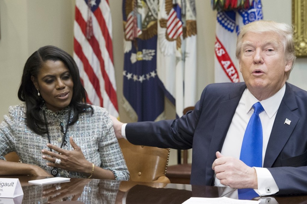 US President Donald Trump speaks beside Omarosa Manigault-Newman, then director of communications for the Office of Public Liaison, during a meeting on African American History Month in the Roosevelt Room of the White House in Washington on February 1, 2017. Photo: EPA-EFE