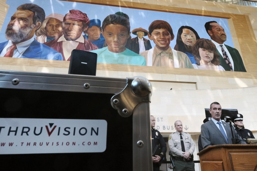Transportation Security Administration (TSA) administrator David Pekoske, centre, talks during a news conference in Los Angeles' Union Station on Tuesday to announce the deployment of ThruVision suicide vest-detection technology on the Los Angeles subway. Photo: AP