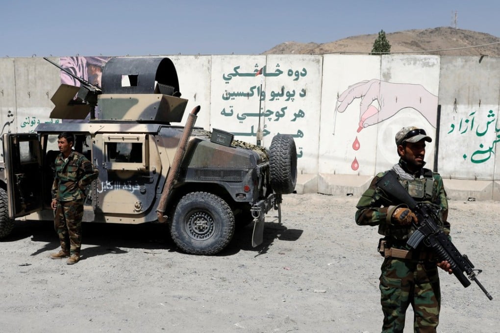 Dozens dead after Taliban attacks military outpost in Afghanistan ...